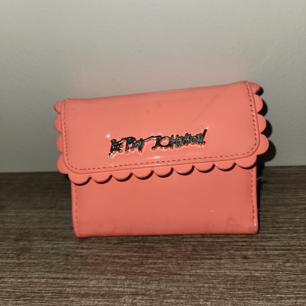 coral wallet with scalloped edges